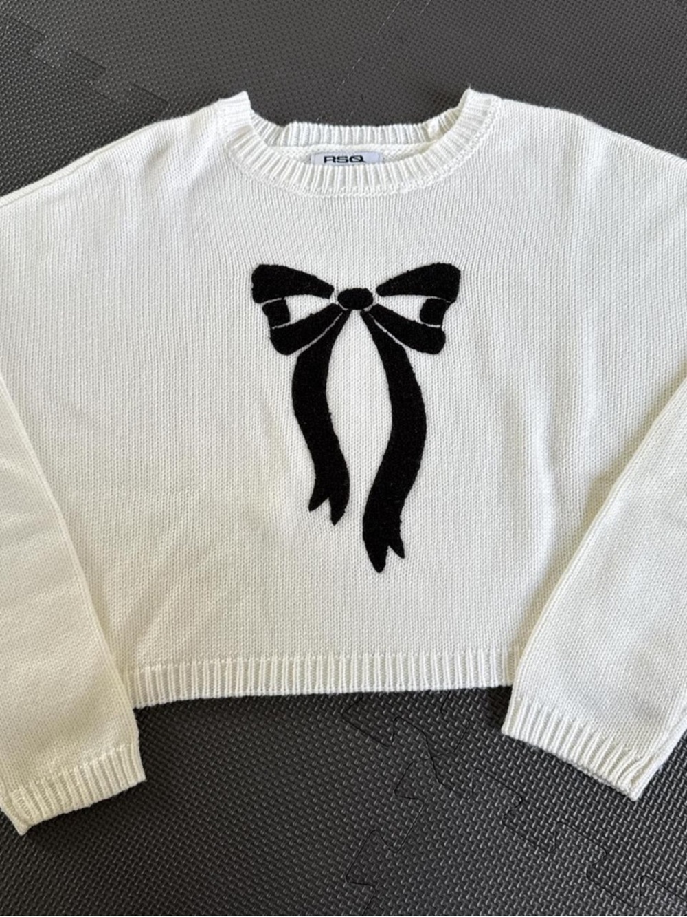 RSQ White Crewneck Sweater with Black Bow Motif